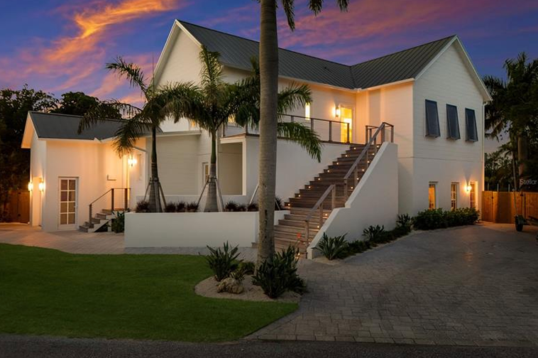 Coastal Elegance with Private Waterfront Oasis in Holmes Beach